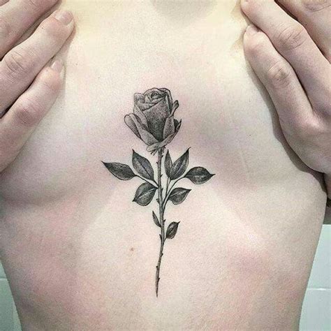 tattoos between your breast|Tattoo between breast